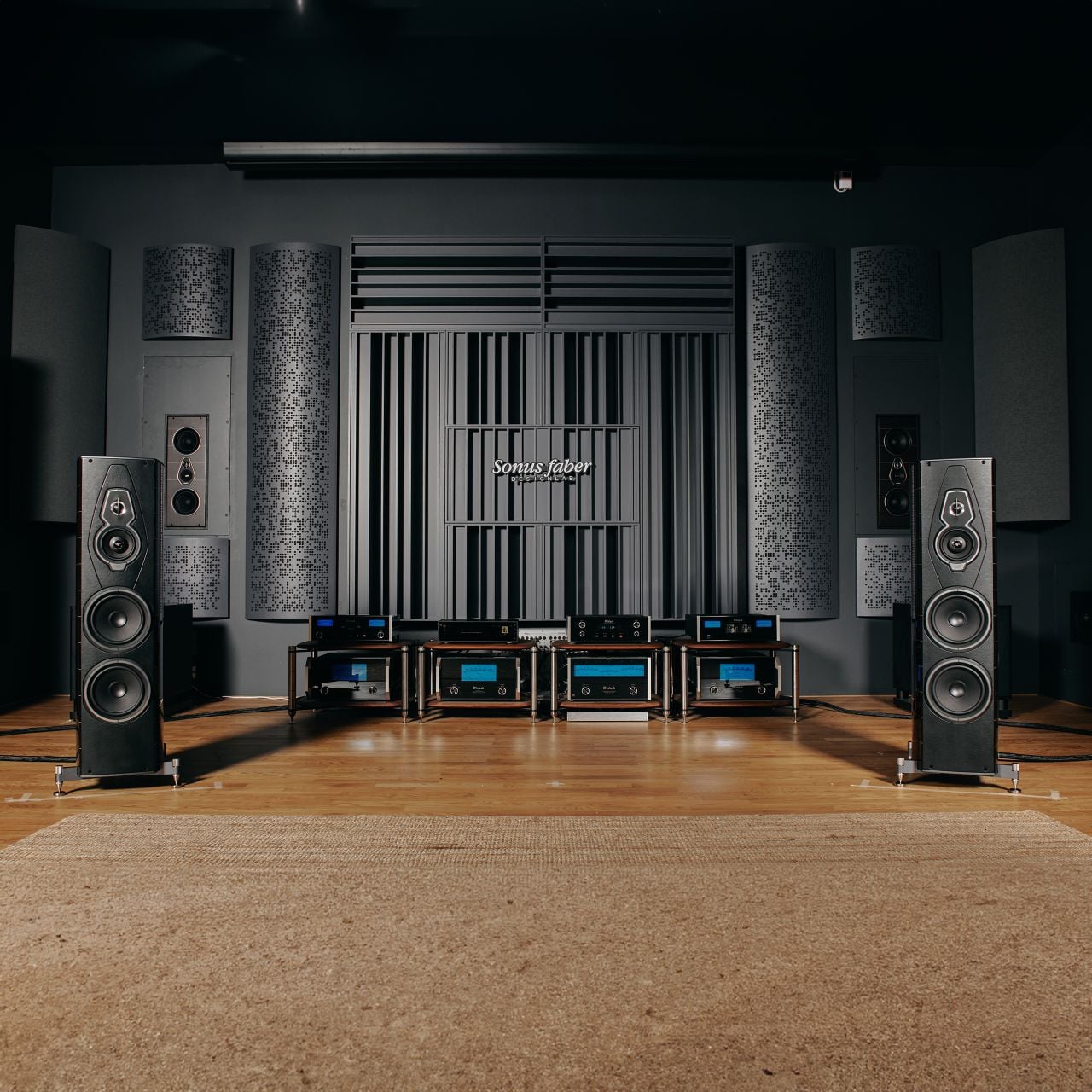 Sonus faber design lab: Fusion of floorstanding, wall speakers, and McIntosh setup for testing speakers like Vox G3.